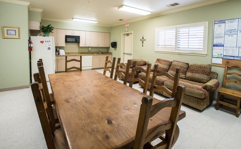 Community Clinics Cut Waiting Times With New Triage Patients sit in a bright community clinic waiting room before their appointments.