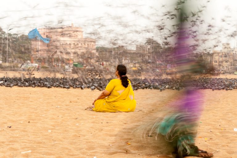 Therapy in Your Pocket: The Rise of Mental Health Tech A woman meditating calmly at home