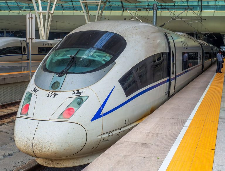 Freight Rail’s Quiet Comeback in the Age of E-Commerce A long freight train hauling stacked shipping containers